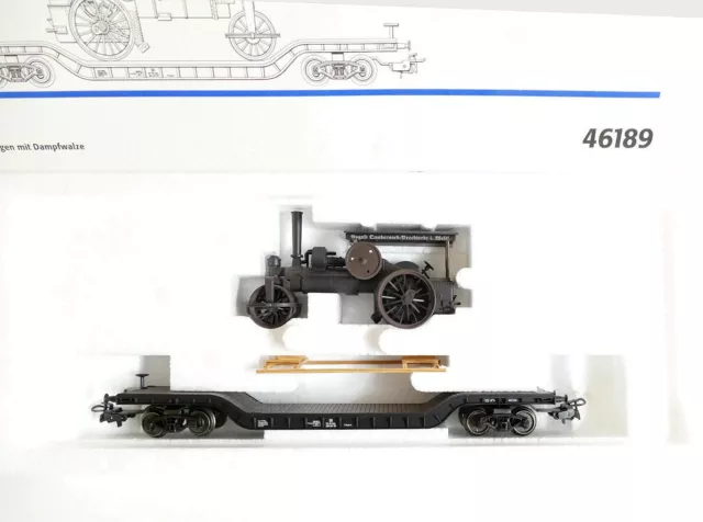 ✅ Märklin H0 46189 Tiefladewagen mit Dampfwalze der DB in OvP.