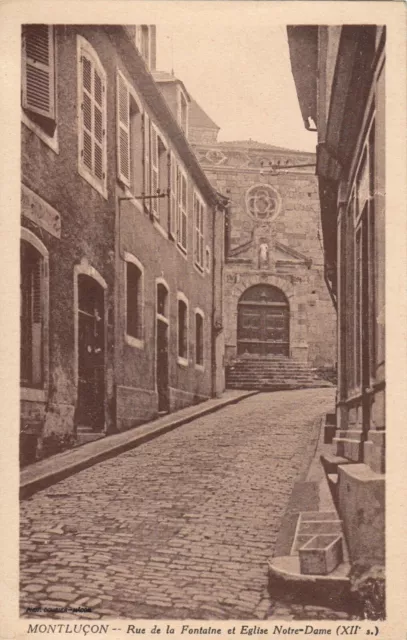 Carte postale ancienne ALLIER MONTLUCON rue de la fontaine et église notre-dame