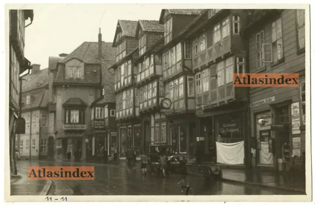 Foto AK Celle Straße mit Fachwerkhäuser und Geschäfte 1930er