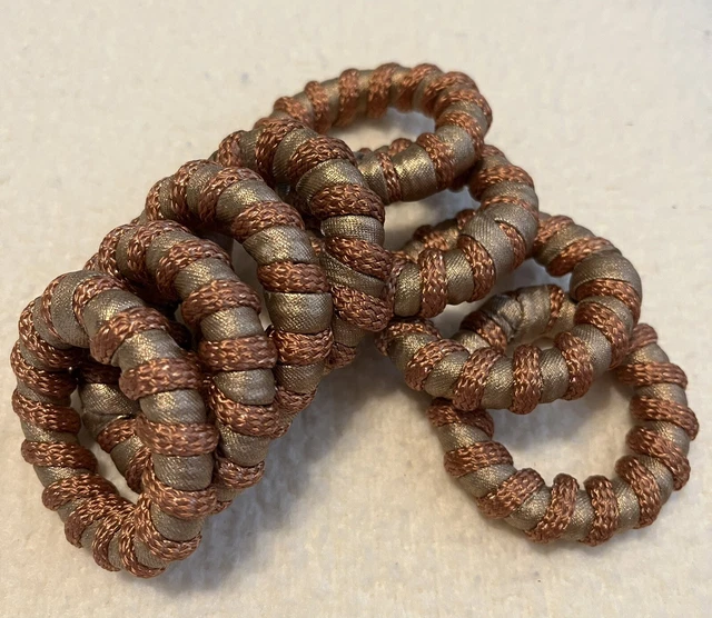 Juego de 8 elegantes anillos de servilleta cuerda de cobre trenzada de bronce entrelazada