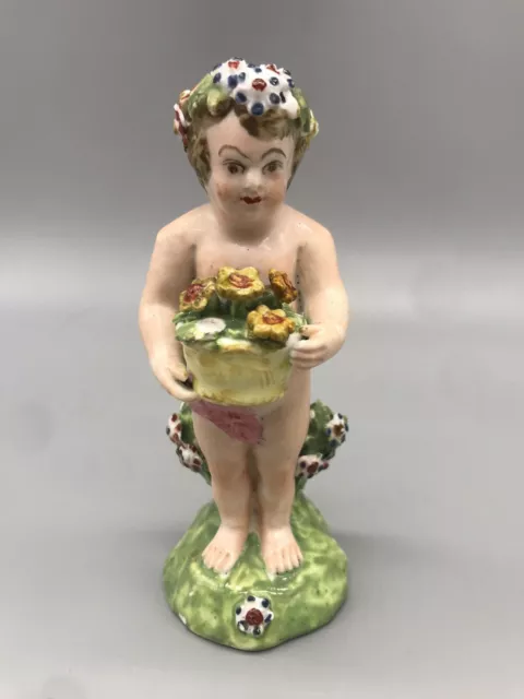 LATE 18TH / 19TH CENTURY CHELSEA DERBY PORCELAIN FIGURE OF A CHERUB 12cm