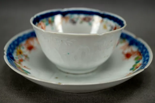 18th Century Chinese Export Embossed White & Painted Floral Tea Bowl & Saucer