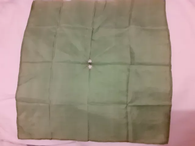 Magic Apparatus - Approximately 12inch square GREEN SILK - holed in centre. POOR