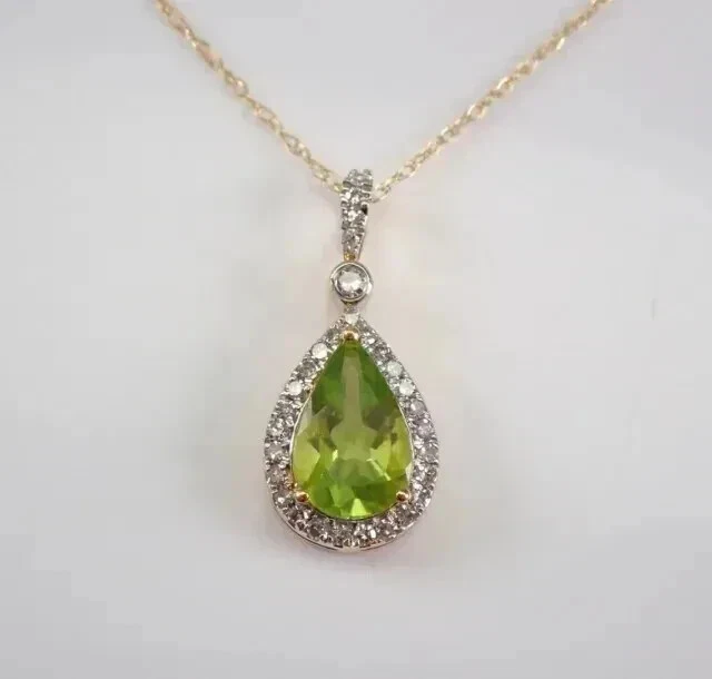 2.20Ct Pear Cut Lab-Created Green Peridot Halo Pendant 14k Yellow Gold Plated