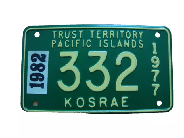 NOS 1977 Kosrae Motorcycle License Plate in Mint condition with 1982 sticker