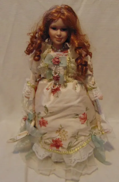Collectible Porcelain Dolls- fancy floral dress and umbrella