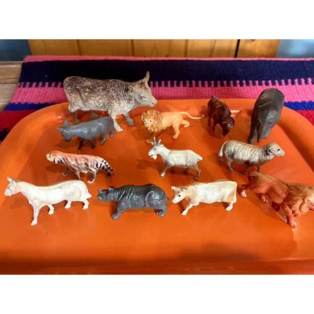 Set of 12 play animals- 10 are celluloid 2 are plastic