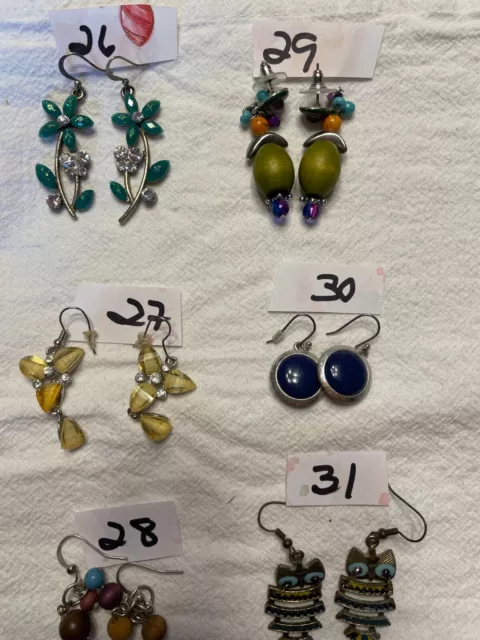 6 pair of fun earring just for the heck of it $10.00 each or $40.00 for all 6