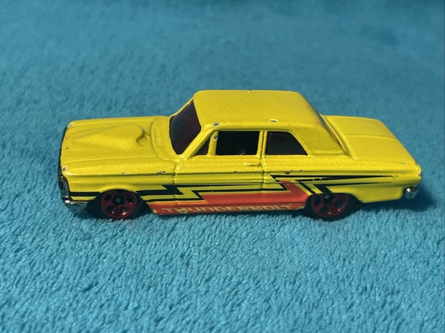 1964 Ford Fairlane Thunderbolt Hot Wheels Yellow Red Glass and wheels