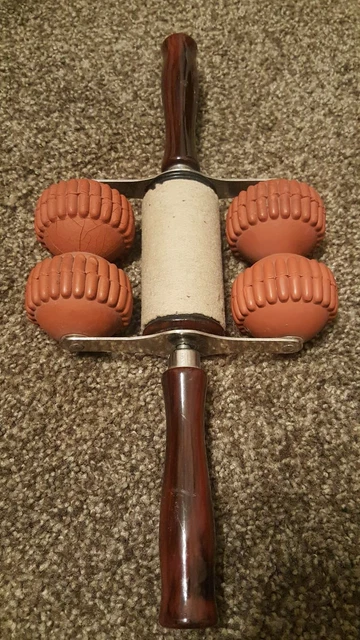 Vintage-Antique Miracle Builder Massager bake like Handles