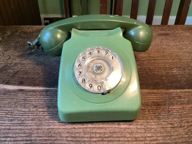 Vintage 1970s 80 rotary dial telephone in green