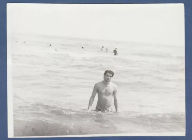 Shirtless guy in swim trunks, bare torso bulges muscles, bare feet Vintage Photo