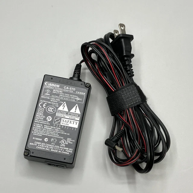 Cargador adaptador de corriente compacto original Canon CA-570 DC 8.4V 1.5A 17W 50/60Hz