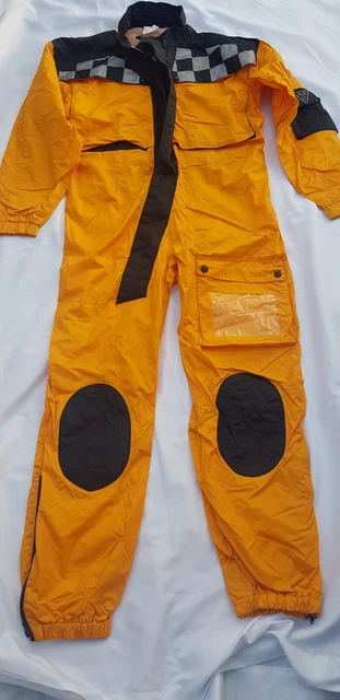 Triumph waterproof motorbike suit. Size UK XL. A lightweight 1 piece waterproof