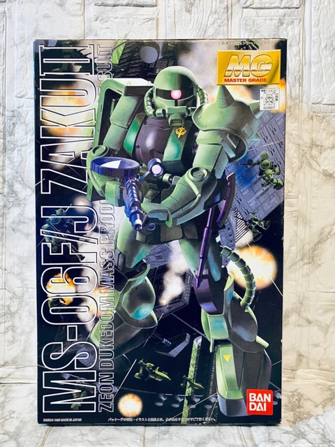 Bandai Master Grade 1/100 MS-05B ZAKU I Model Kit – Gundam Old Zaku With Machine Gun, Bazooka & Heat Hawk