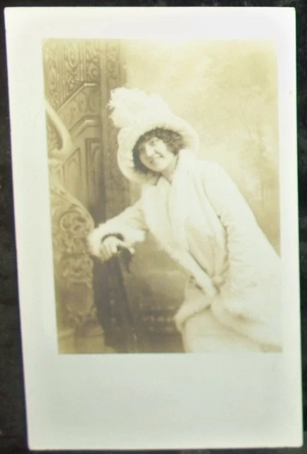 RPPC woman leaning and smiling No ID vtg real photo postcard Orpheum/Chicago IL