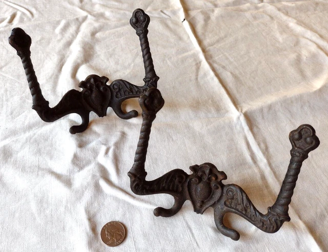 Pair of ANTIQUE WALL COAT HOOKS "LB 33" Fleur De Lis Crest CAST IRON 5.5"