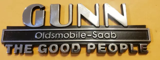 Gunn-Olds-Saab--"The Good People"--Metal Dealer Emblem Car  vintage SM1399