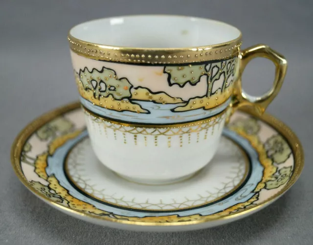 Nippon Japanese Hand Painted Gold Beaded Landscape Border Coffee Cup & Saucer