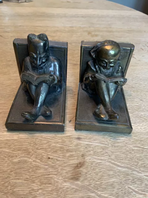 antique TK Metal Reading Metal Bookends