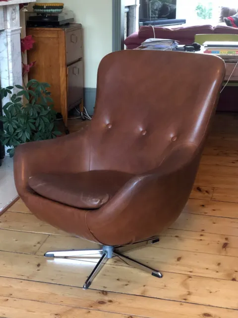 Vintage mid century vinyl leatherette egg style chair on chrome swivel base