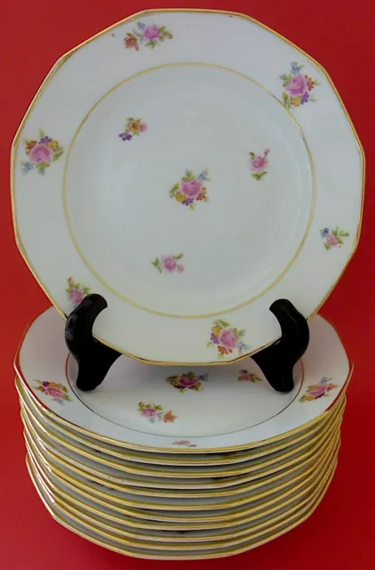 Suite de douze (12) assiettes à potage dodécagonales en porcelaine de Limoges