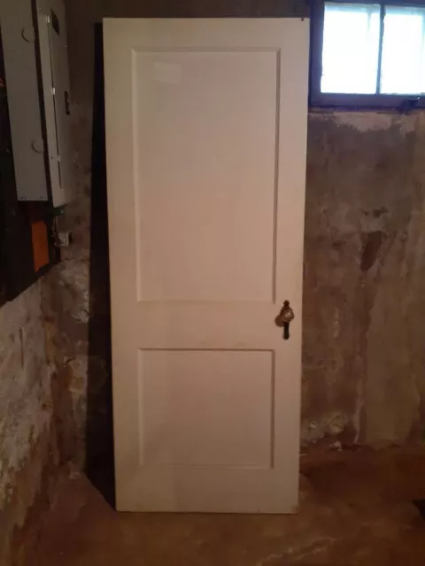 1941 vintage 2 panel, white, solid wood vintage door with glass handles