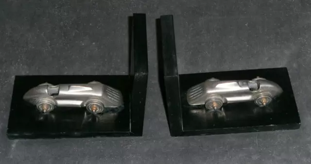 A Pair Of Bookends With Art Deco Style Racing Cars  Silver Mercedes Auto Union