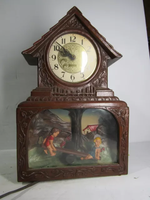 Haddon Teeter Totter Red Roof Electric Light Up Motion Clock Works