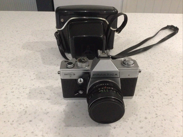Ancien Appareil photo argentique reflex 35mm Praktica MTL 5