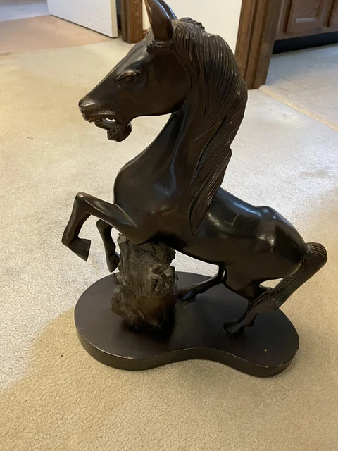 hand carved wooden horse statue