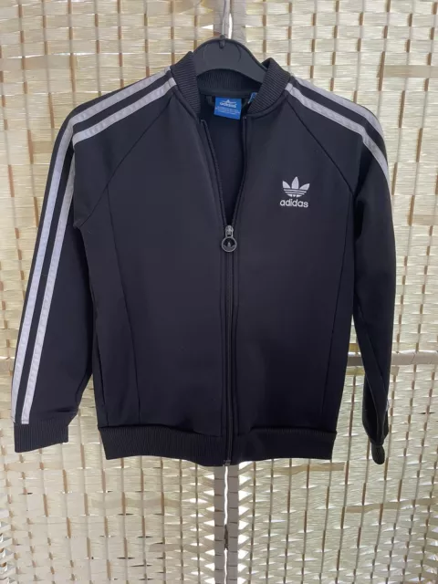 Adidas pista top ragazzo nero con striscia bianca età 9 anni