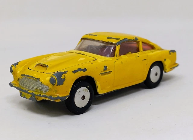 Corgi Toys 218, Aston Martin DB 4, neuve en boîte - & BD