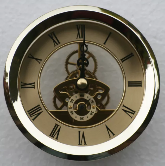 Skeleton Clock 103mm diameter quartz insertion, brass finish.