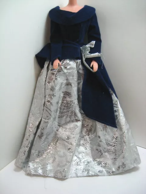 1995 Avon Barbie Winter Velvet blue silver gown