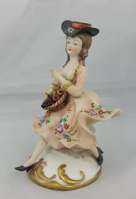 Capodimonte Figurine Seated Girl with Fruit Basket - Minor Chip 2