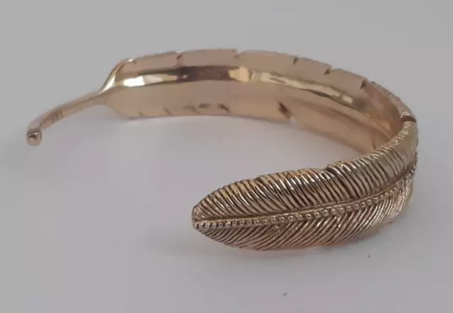 Gold plated feather cuff bracelet with crystal detail