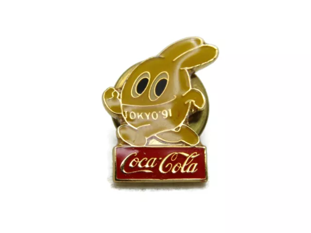 Tokyo '91 Coca Cola Pin Yellow Cartoon Graphic & Gold Tone