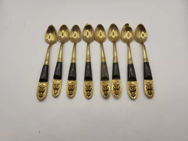https://www.picclickimg.com/0h8AAOSwQRhlLCkz/Thailand-Brass-And-Black-Handle-Teaspoons-With-Budda.webp