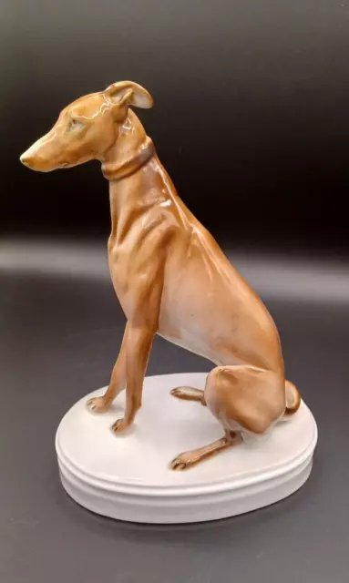 Sold at Auction: VINTAGE TUPPERWARE INCLUDING ROUND CAKE CARRIER, SQUARE  CONTAINER & SEVERAL SMALLER CONTAINERS, VINTAGE PORCELAIN TAN  GREYHOUND/WHIPPET LURCHER DOG SCULPTURE + 1 OTHER FIGURE