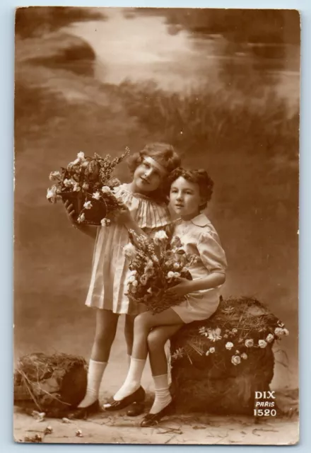 Cute Children Postcard RPPC Photo Curly Hair With Flowers Studio 1919 Antique