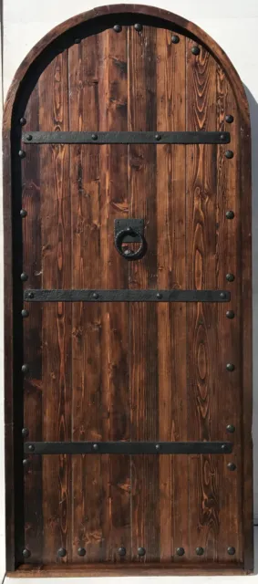 Rustic reclaimed lumber arched top door solid wood story book castle winery