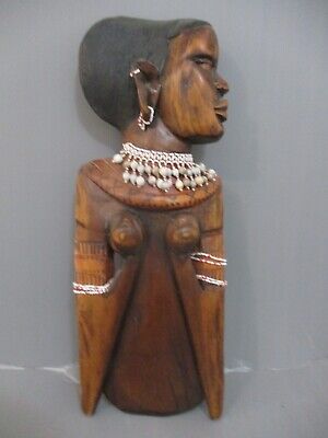 African art: tribal art, a wooden carved  figurine of young girl, Africa,60's