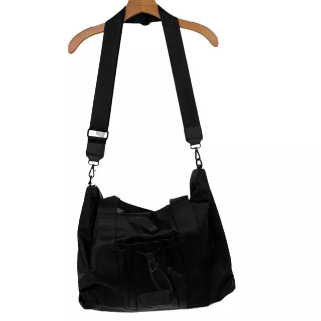 Chanel Cc Sport Line Black Duffle Bag – House of Carver