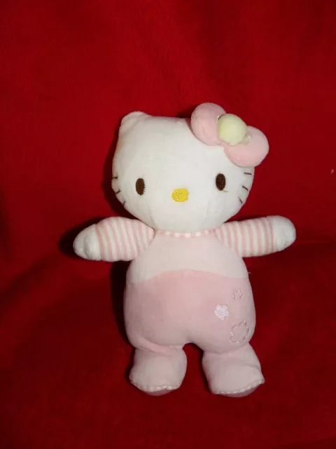 Doudou Hello Kitty blanche salopette rouge petit sac rose Sanrio