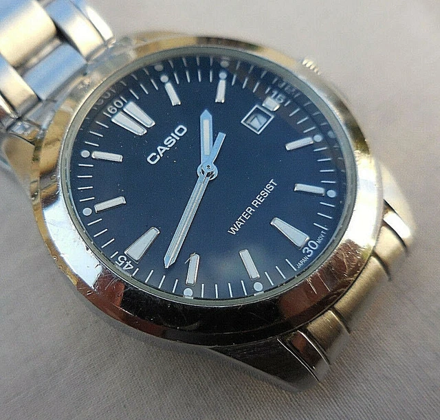 ANCIENNE CASIO 2784,ELEGANTE Montre Plate Mixte A Guichet Date Des ...