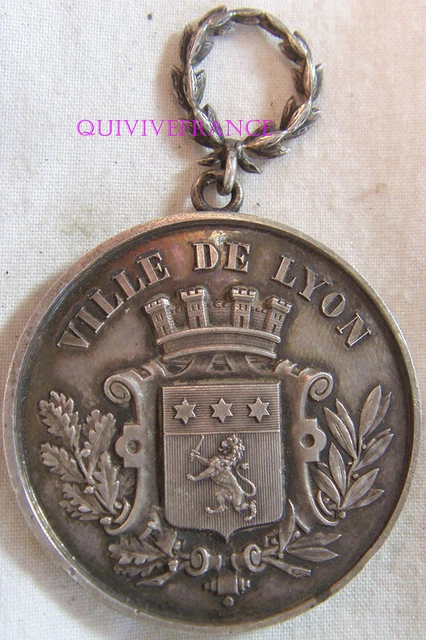 Médaille : Définition simple et facile du dictionnaire
