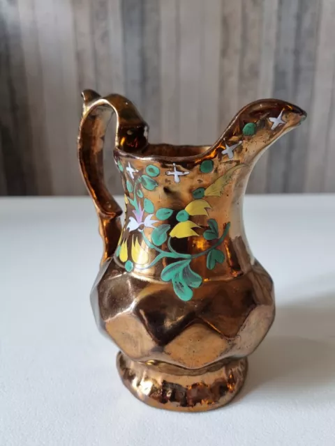 Pichet en faïence de Jersey  à décor de fleur                                   