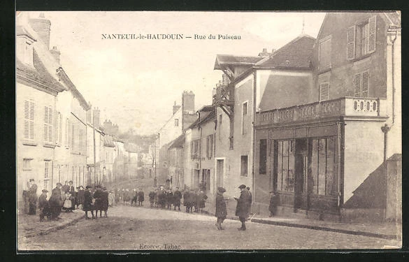 CPA Nanteuil-le-Haudouin, Rue du Puiseau, vue de la rue