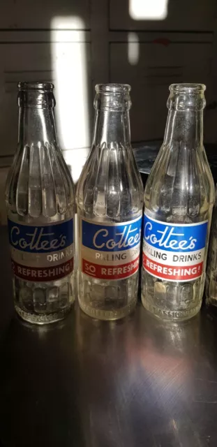 Vintage Cottees /Passiona Embossed Bottles.  7oz.  60's Pyro Ceramic Label.  X 6